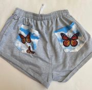 Gray lounge shorts with butterfly design