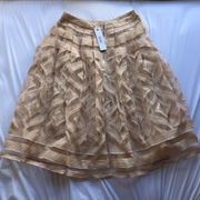 Nude Pleated Mid-Length Skirt