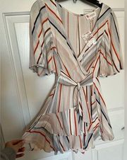 Cute flows romper never worn w/ tags! Size Small