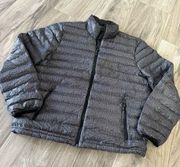 Zeroposur black and gray lightweight puffer jacket size XL.