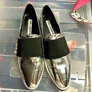 Women’s size 7 chrome Karl Lagerfeld slip on loafers