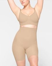 Skims Seamless Sculpt Mid Thigh Short Shapewear in Clay Size Medium