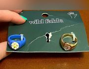 NWT Wild Fable Set of 2 heart rings purple/white and gold/clear