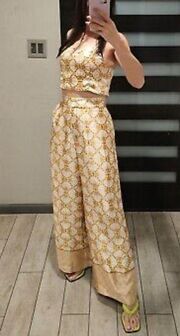 House of Harlow 1960 “Gold Sun” printed wide leg satiny pants 60s 70s disco