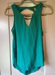 Turquoise blouse with gold detailing and cowl back