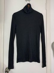 NWT, black, long sleeve, ribbed, turtleneck top. Rayon, polyester, spandex M