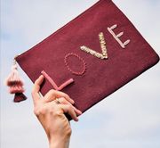 Stella and Dot Maroon Love Zipper Clutch