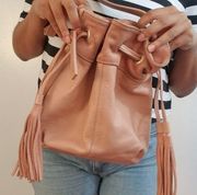 AEO American Eagle Bucket Bag in Leather with Tassel Detail Pale Pink