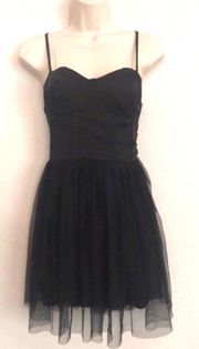 Adorable and playful  black dress.