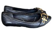 BCBGMaxAzria Black Leather peep toe flats with gold buckle and grommets Size 9