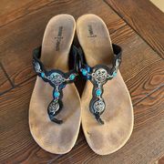 Minnetonka Leather Sandals with Western Metal Detail