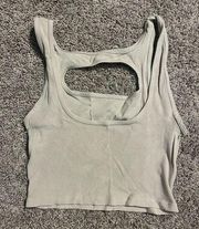 La front cut Lululemon crop tank with cutout chest. Size 4/6