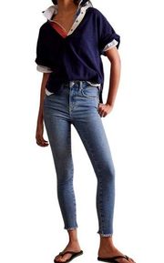 Free People We the free light wash skinny blue jeans with raw hem size 26