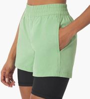 Weworewhat layered green black spandex running shorts