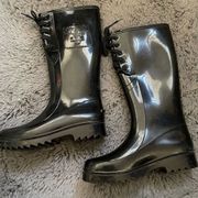 See by Chloe black tie rain boots
