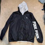 Black zip up rain jacket never worn with hood