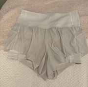 size 2 high waisted limited edition flowey shorts with spandex under