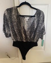 grey snake  body suit