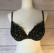 Daisy Fuentes giraffe push-up bra