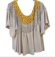 NWT Hummingbird Womens large Isa mixed patterned flowy short sleeve yellow top