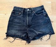 Redone Cut Off Raw Hem Shorts in Black Denim