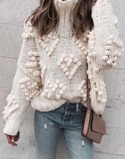 ChicWish Knit Your Love Heart Pom Turtleneck Sweater in White