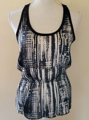 Black Poppy  abstract peplum tank size small