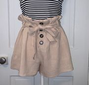 high waisted tan / beige paper bag shorts with button front