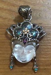 Barbara Bixby:  Quan Yin vintage very rare enhancer mother of pearl craved face.