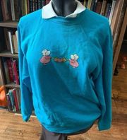 Vintage Sweats Appeal Tultex cross-stitch Dutch doll blue collared L sweatshirt