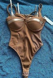 Brown bodysuit.