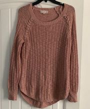 Large, pink sweater