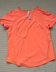 Light Weight Stretch Run Short Sleeve Color Orange  In Size 2