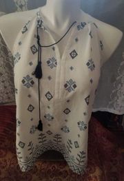 ARTISIAN NY size medium sleeveless, sheer top cream colored with dark blue print