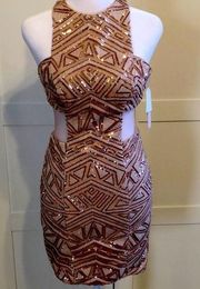 Structured Rose gold sequin  mesh side mini dress .