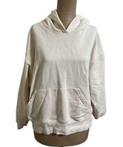 We wore what cream hooded sweatshirt with front pocket size Medium