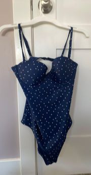 navy poka dot swimsuit