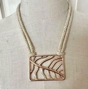 Vince Camuto rose gold hemp cord  rectangle leaf pendant necklace