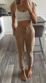 Meshki tan joggers size medium