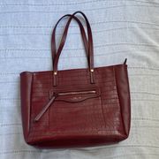 large red hand bag.