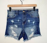 Medium Wash High Rise Distressed Cut Off The Icon Short