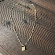 Oak & Luna Initial “L” lock pendant paperclip chain gold vermeil necklace