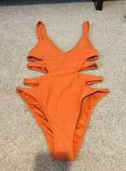 Forever 21 Rust orange cut out sides one piece swimsuit never worn