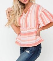 Downeast Emberely Peplum Top with Pom Pom’s