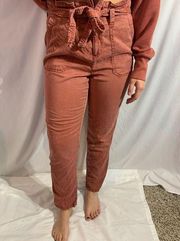 Maurice’s rust color paper bag waist pants with a belt. Ankle length, size 6.