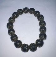 Black Bead with Gold Tone Filigree Stretch Bracelet