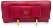 - Prada Fuchsia Saffiano Leather Bow Continental Wallet