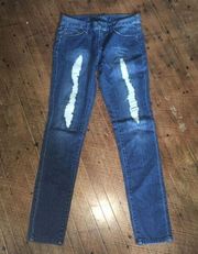 Bebe distressed shimmery patch size 27 skinny jeans