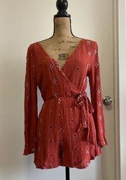 Orange embroidered wrap romper