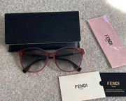 Fendi transparent red gradient oval sunglasses